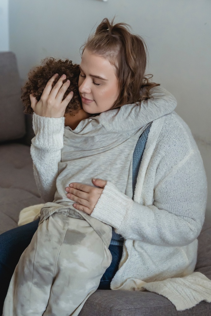 Women hugging her son